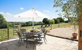 The Cow Shed offers space and tranquility. The patio is fully enclosed and beyond is the meadow, which is a wonderful space for you and your hound to enjoy. - Thumbnail Image