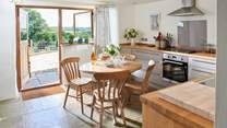Enjoy a relaxing meal with stunning countryside views.