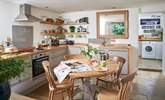 The contemporary kitchen/dining-room not only suits the cottage perfectly, but has everything you need to enjoy your holiday here, with plenty of worktop space too. - Thumbnail Image