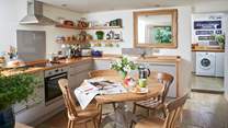 The contemporary kitchen/dining-room not only suits the cottage perfectly, but has everything you need to enjoy your holiday here, with plenty of worktop space too.