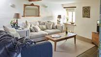 There is plenty of room on the comfortable sofas for everyone to snuggle up and relax after a long day exploring your holiday destination.
