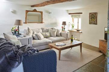 There is plenty of room on the comfortable sofas for everyone to snuggle up and relax after a long day exploring your holiday destination.