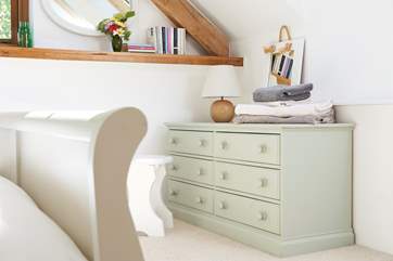 There is plenty of light and all the other touches make this a really welcoming room.
