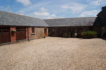 The front of The Old Byre (to the left) and the neighbouring property The Granary (2982).