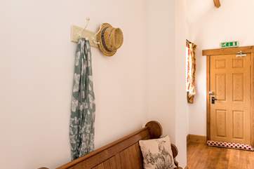 From the spacious hallway you can access the garden.