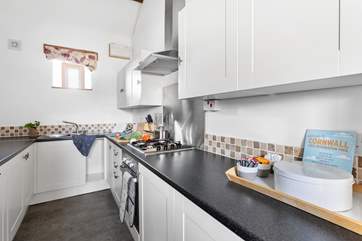 The galley-kitchen has all that you need to cook up a treat.
