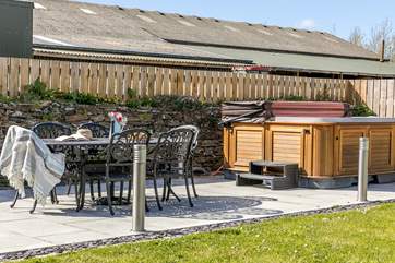 Relax in the hot tub and enjoy al fresco dining in the fabulous garden.