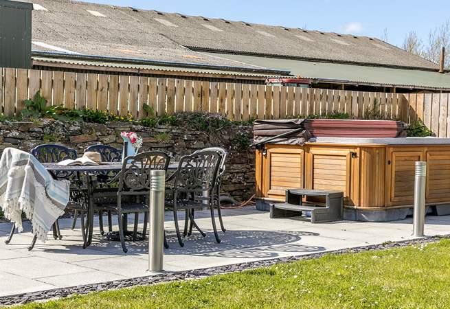 Relax in the hot tub and enjoy al fresco dining in the fabulous garden.