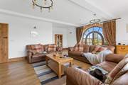 The sitting-room has plenty of room for everyone to chill out and relax.