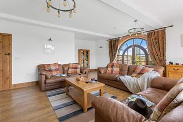 The sitting-room has plenty of room for everyone to chill out and relax.