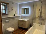The newly fitted bathroom with fitted shower.