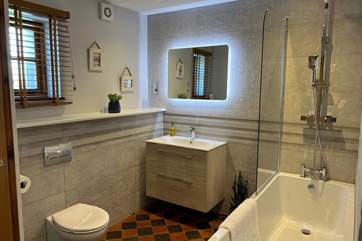 The newly fitted bathroom with fitted shower.
