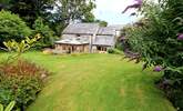 Looking back at the cottage from the very spacious garden. - Thumbnail Image