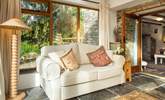 Sit back and relax in the conservatory enjoying the view over the garden. - Thumbnail Image