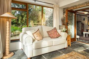 Sit back and relax in the conservatory enjoying the view over the garden.