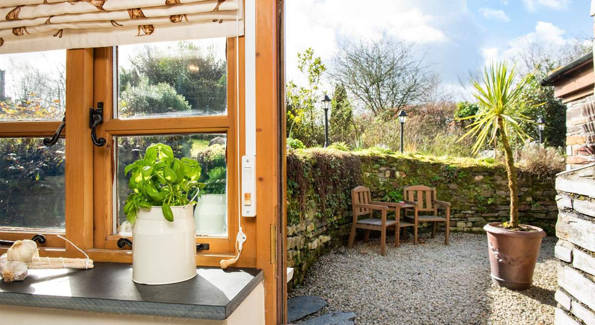 The stable-door leads out from the kitchen to the back garden.