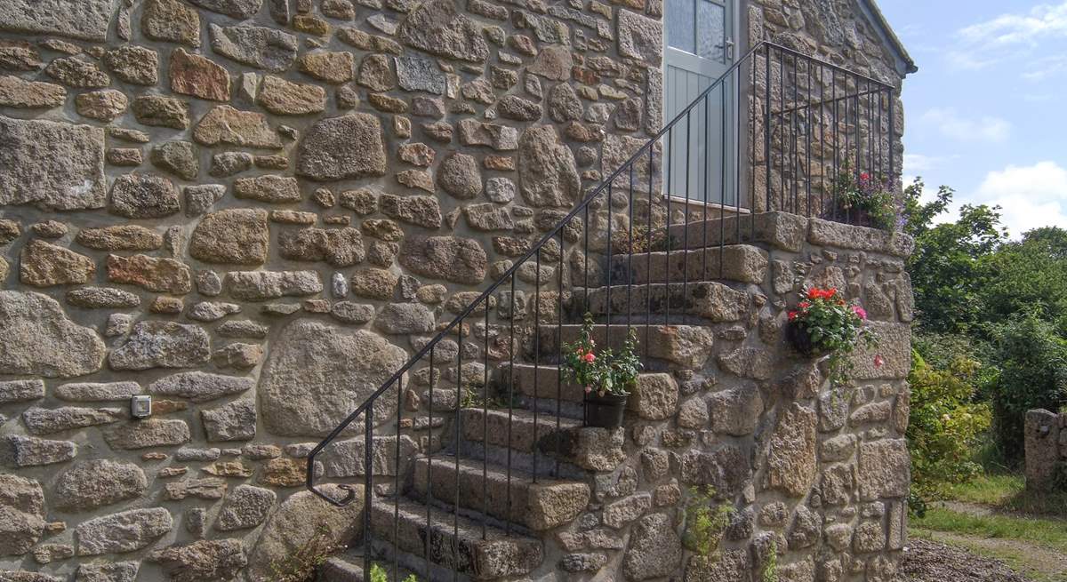 Steps lead up to the property.