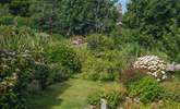 The view down the steps to the pretty garden, which is shared with the lovely owner who lives next door.  - Thumbnail Image