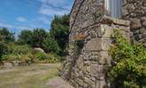 The pretty parking-area looking towards the garden, with granite steps to the front door. - Thumbnail Image