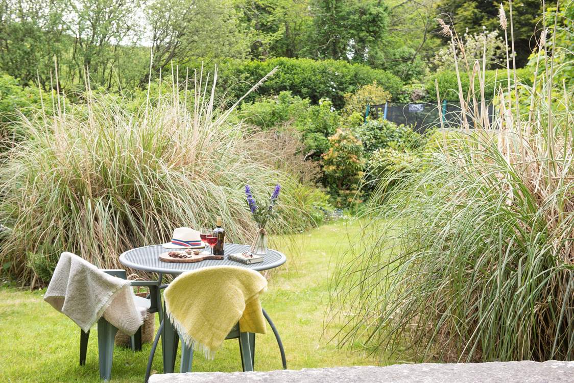 Enjoy al fresco dining in this sunny spot.