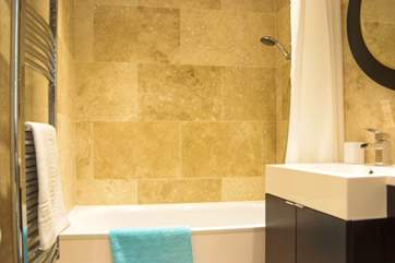 This bathroom is shared by bedrooms 3 and 4.