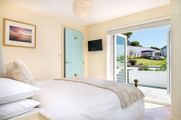 Patio doors from Bedroom One lead out to the garden