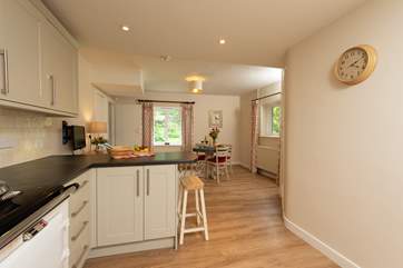 Another view of the open plan kitchen/dining-room.