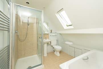 The modern, bright family bathroom.