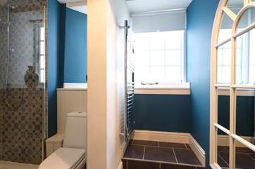 The shower room is adjacent to the bedroom on the ground floor.