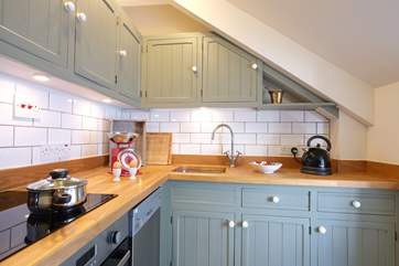 The kitchen has a sloping ceiling so please mind your head if you are tall.