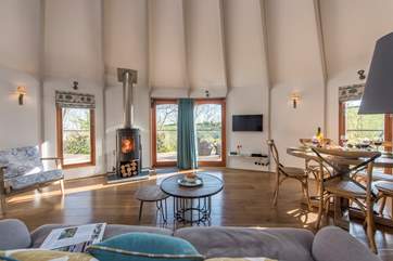 There is a huge 8 metre diameter living space in the large yurt and a triple bunk bedroom an en suite shower-room in the smaller yurt.