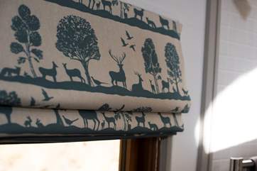 Beautiful fabrics have been used throughout.