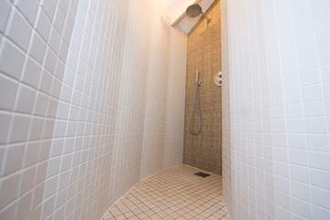 The luxurious en suite shower-room to the bunk bedroom.
