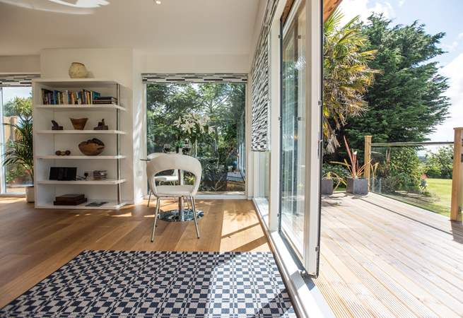 The sitting-area leads onto the super decked terrace.