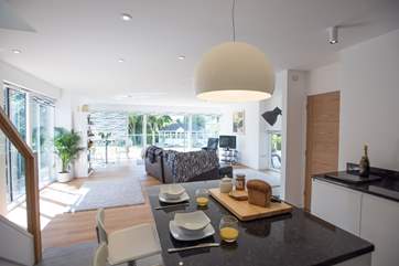 The kitchen area and open plan living area.