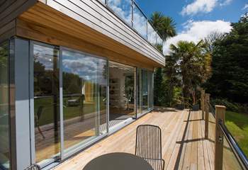 The faboulus decked terrace invites you to dine al fresco.