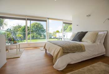 A dreamy comfy bed with a gorgeous terrace surrounded by countryside.