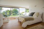 A dreamy comfy bed with a gorgeous terrace surrounded by countryside.