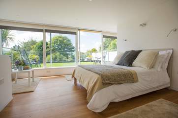 A dreamy comfy bed with a gorgeous terrace surrounded by countryside.