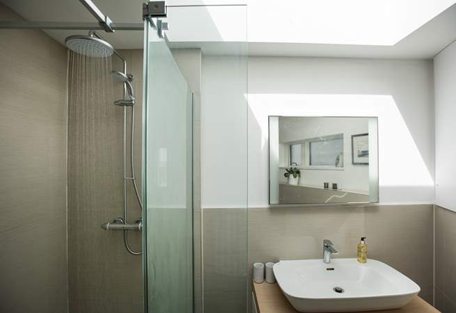The en suite shower-room with walk-in rainfall shower.