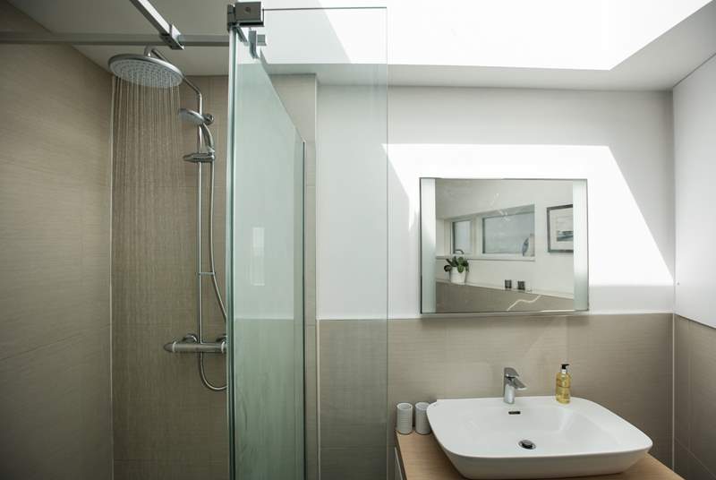 The en suite shower-room with walk-in rainfall shower.