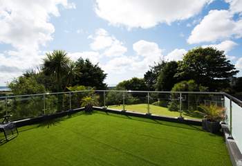 The balcony accessed through the bedroom.