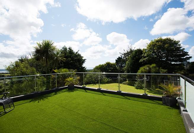 The balcony accessed through the bedroom.