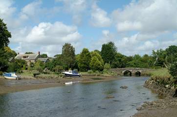 The ancient bridge that crosses the river.