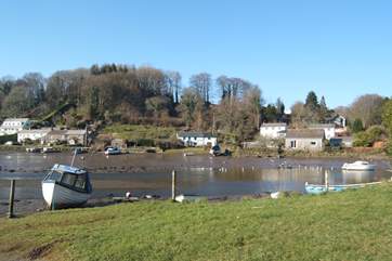 The river at low tide; canoes and kayaks can be easily launched from the riverbank.