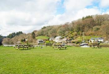 Enjoy a cream tea on the village green watching the comings and goings along the river.