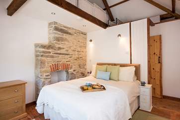 A lovely comfy bed to relax in.
