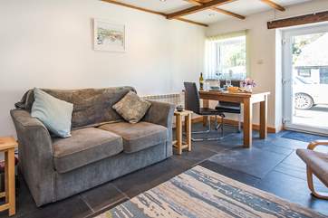 Relax on the comfy sofa after a day out exploring the delights of the area.