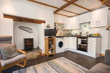 The woodburning effect electric stove creats a focal point and adds warmth (without the effort!)