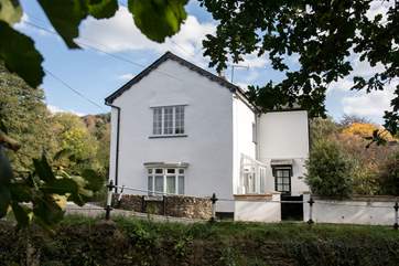 St Giles Cottage is on a quiet lane, with a little river running beside.